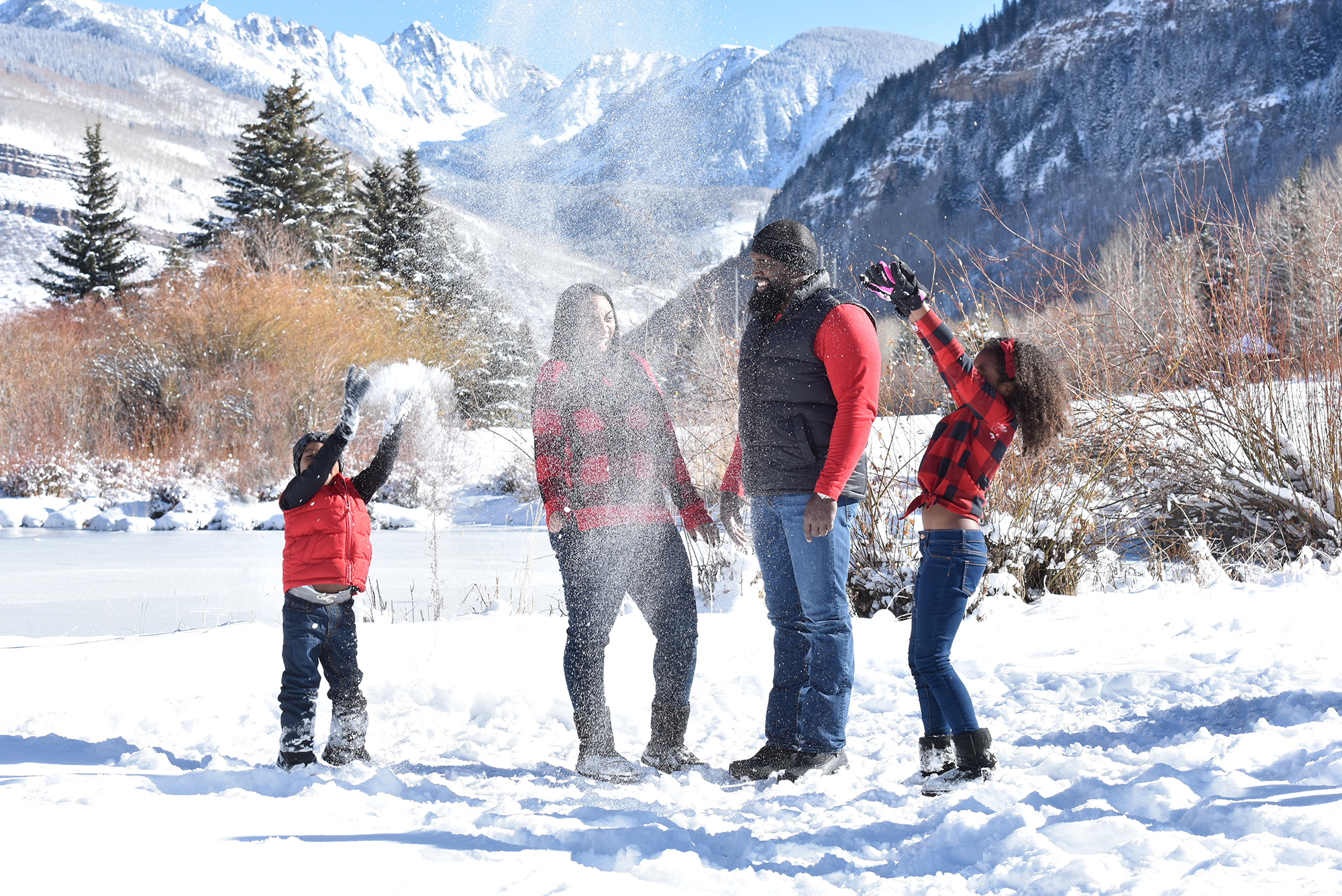 family Playing in the Snow